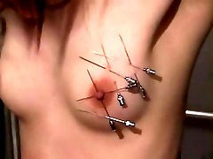 Hammering the tits. A tear falls from her eye just as she sees me pick up the hammer